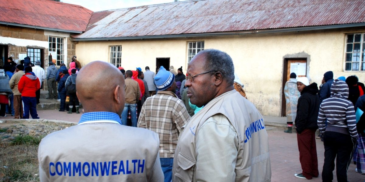 Image: The Chair of Commonwealth observers to Lesotho elections, former Malawi President Dr Bakili Muluzi (right) at a polling station in Maseru Lesotho on 26 May 2012. Photo © Julius Mucunguzi