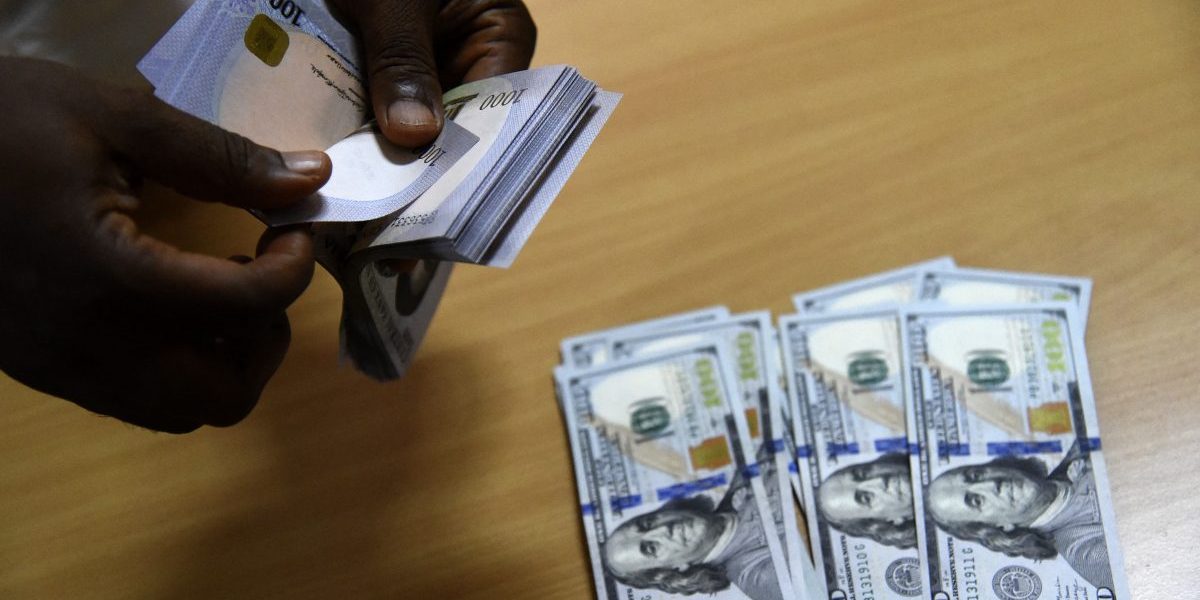 Cover image: A man exchanges Nigeria’s currency, Naira, for US dollars in Lagos, Nigeria. Image: Getty, Pius Utomi Ekpei/AFP