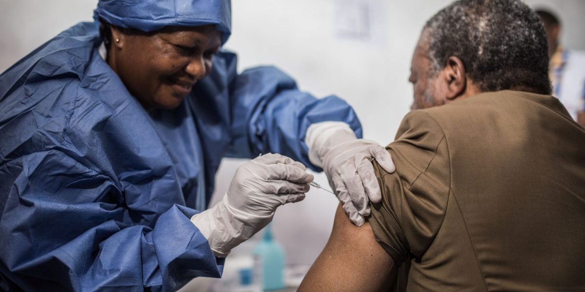 DRC, Goma: Doctor Jean-Jacques Muyembe Tamfun being inoculated with an Ebola vaccine on November 22, 2019. Image: Getty, Pamela Tulizo/AFP