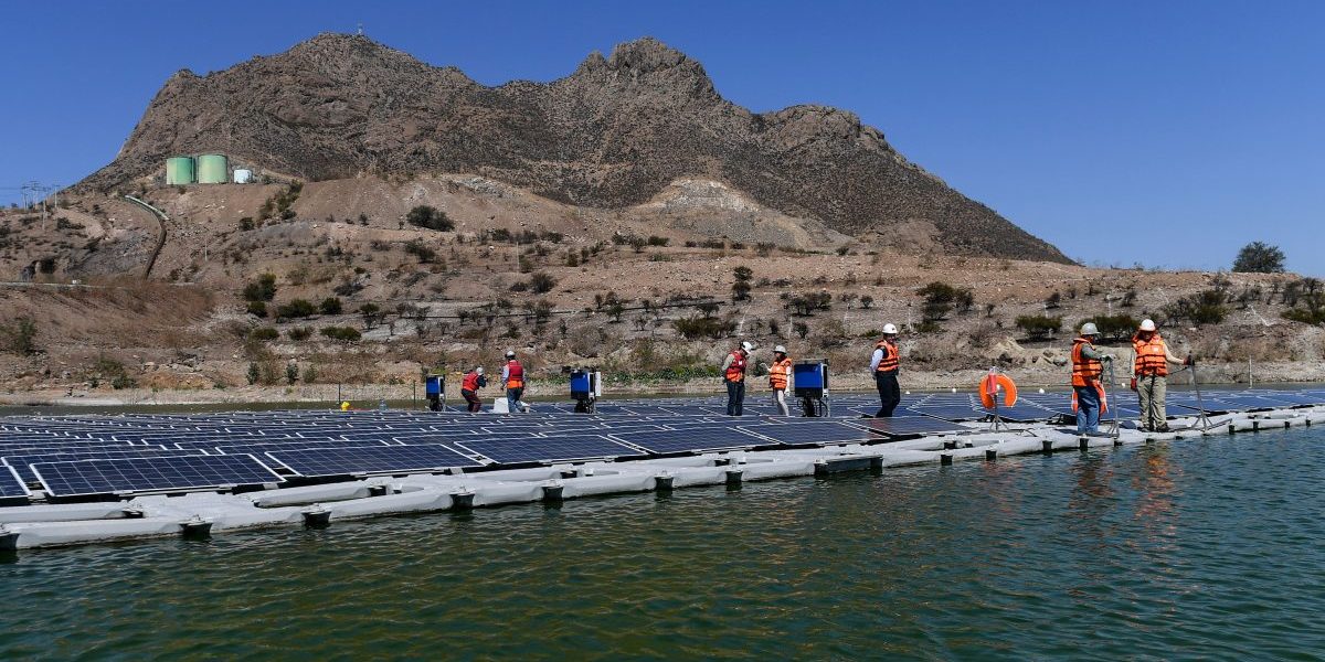View of a floating solar plant of 256 photovoltaic panels installed on a floating platform on mine tailings of the mining company Anglo American in Colina some 35 km north of Santiago, Chile. Image: Getty, Martin Bernetti/AFP