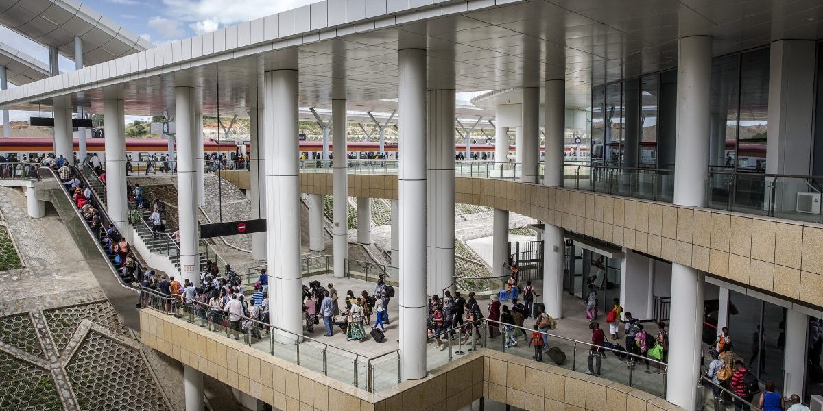 A long line of rail travelers pass along the concourse at Mombasa SGR Terminus station in Mombasa, Kenya, on Saturday, Sept. 1, 2018. China's modern-day adaptation of the Silk Road, known as the Belt and Road Initiative, aims to revive and extend trading routes connecting China with Central Asia, the Middle East, Africa and Europe via networks of upgraded or new railways, ports, pipelines, power grids and highways. Photographer: Image: Getty, Luis Tato/Bloomberg