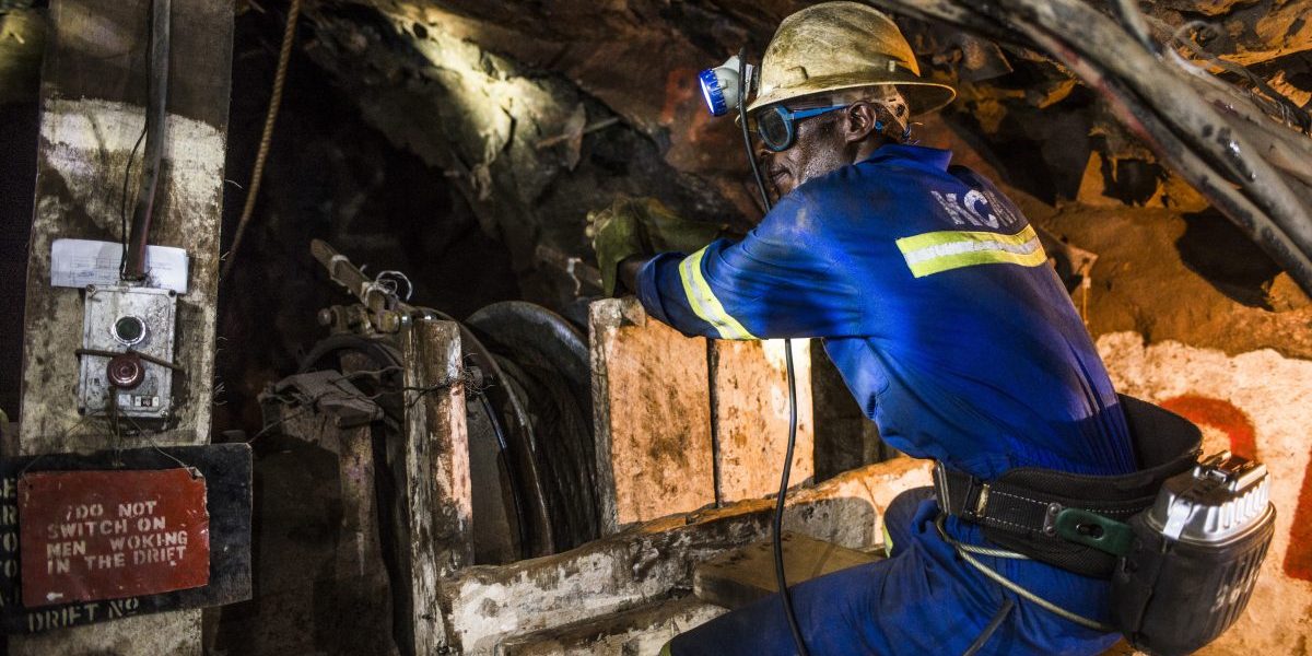 A miner uses a machine to excavate copper ore in an underground tunnel at the 296 meter level at the Nchanga copper mine, operated by Konkola Copper Mines Plc, in Chingola, Zambia. Image: Getty, Waldo Swiegers/Bloomberg