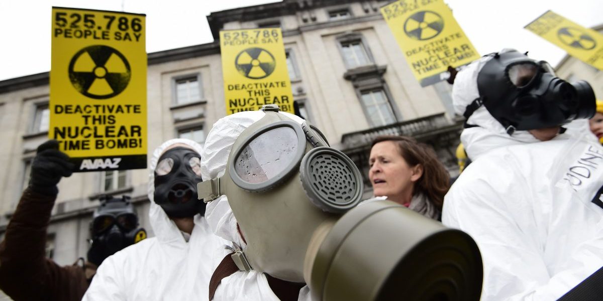 Anti-nuclear activists stage a protest against the lack of safety of Belgian nuclear power plants, outside the
Belgian Interior Ministry in Brussels. Image: Getty Emmanuel Dunand/AFP