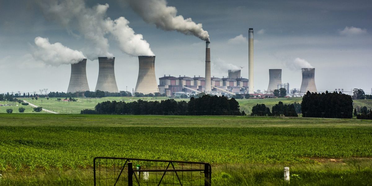 Emissions rise from the cooling towers of the Eskom Holdings SOC Ltd. Matla coal-fired power station in Mpumalanga, South Africa, December 2019. Image: Getty, Waldo Swiegers/Bloomberg