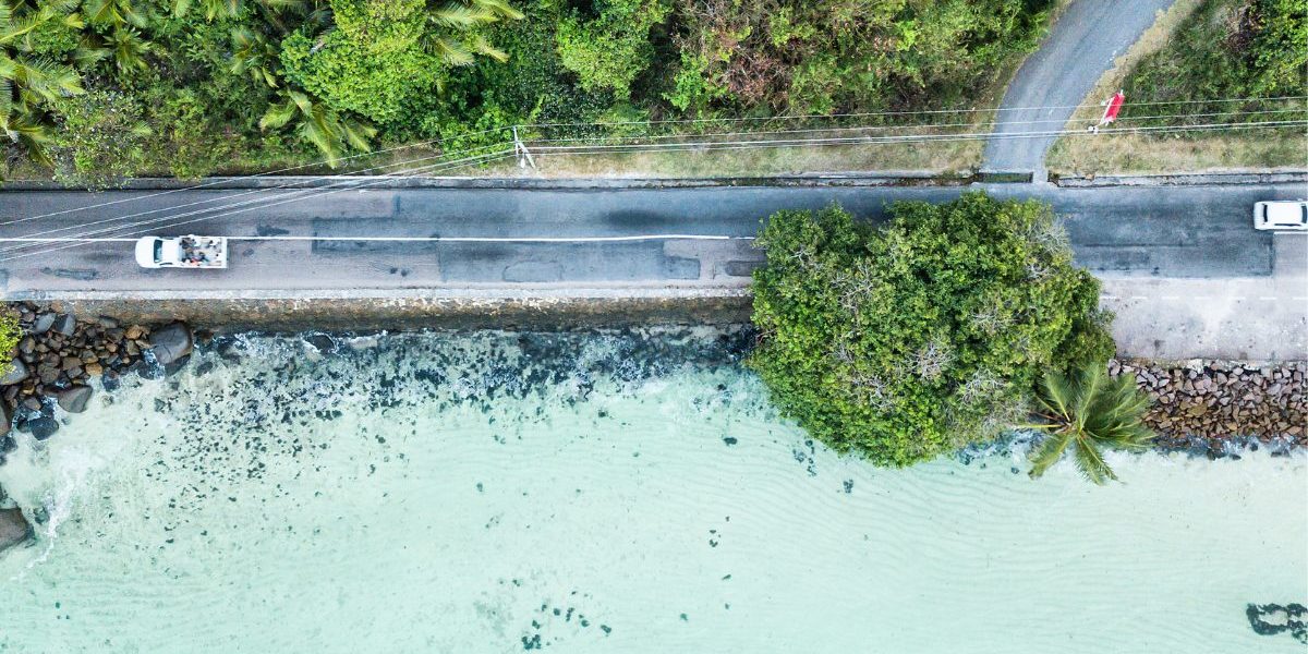 GettyImages-837101742._Aerial view of main road of Mahe Island on the sea – Seychelles (PJPhoto69 via Getty Imagesjpg Financing EbA for Marine and Coastal Resources