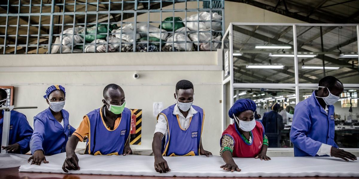 Workers produce face masks at KICOTEC in Kitui, Kenya. Image: Getty, Luis Tato