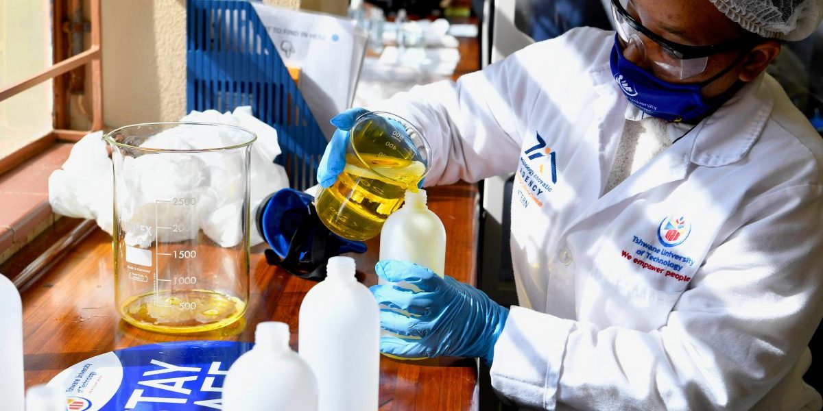 Tshwane University of Technology students produce hand sanitizer to fight COVID-19 during Minister of Higher Education, Science and Innovation Dr Blade Nzimande’s visit to Tshwane University of Technology to assess state of readiness for the phased returning of students to campus, Tshwane, South Africa, June 09, 2020. Image: Getty, Frennie Shivambu