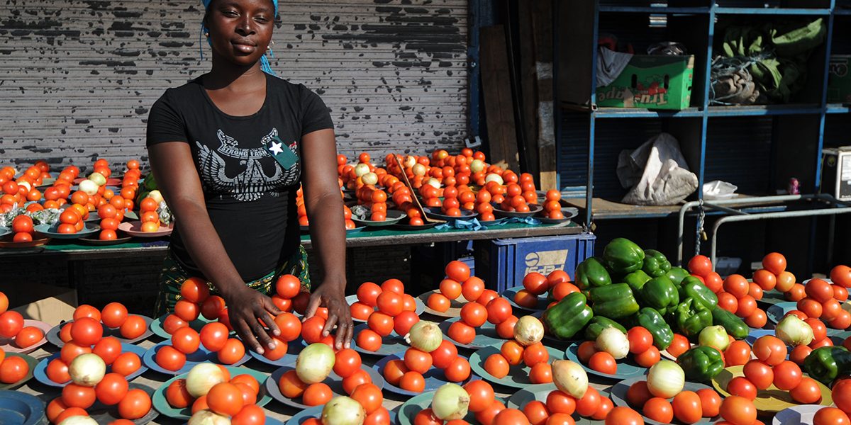 A roadside vendor sells tomatoes, onions and green peppers at the Alexandra township, near Johannesburg, South Africa. Image: Getty, Monirul Bhuiyan/AFP
